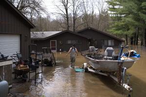 Unprecedented Manistee River levels flooding Wexford Co. homes