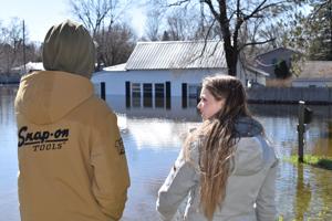 Young couple's new home overrun by flood waters