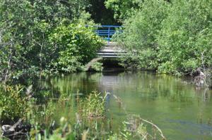 Would dredging the Clam River had lessened the impact of flooding?
