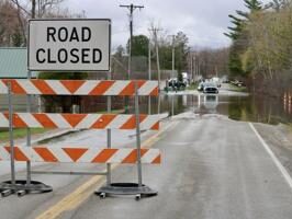 Don't cross barricades, road closed signs for your safety and that of first responders