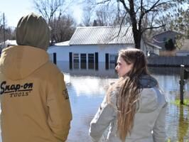 Young couple's new home overrun by flood waters